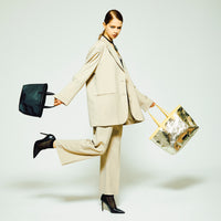 plume tote un S