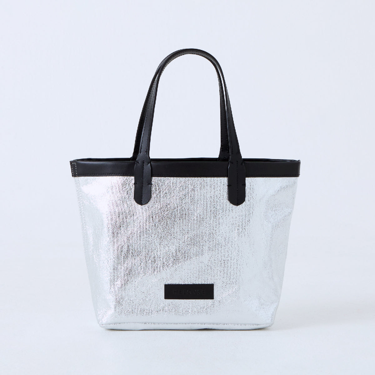 plume tote un S